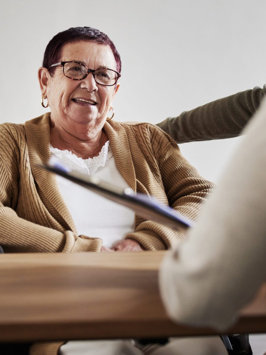 Legal consulting, meeting or senior woman planning on documents for disability compensation, will a.